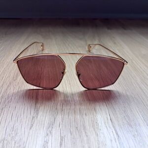 Gucci Gold Frame Sunglasses with Rose Lenses